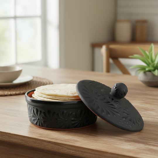 The Talavera Hub black ceramic tortilla keeper with floral motifs, 6" tall, 7.5" diameter.