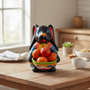The Talavera Hub black ceramic bunny statue with colorful floral details and a small dish.