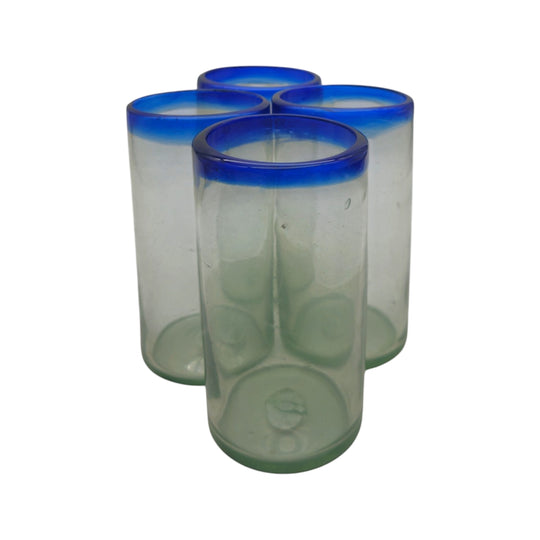 The Talavera Hub hand-blown clear glass tumblers with cobalt blue rims, 18 oz capacity, 6" tall.