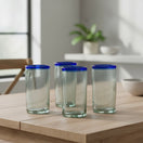 The Talavera Hub hand-blown clear glass tumblers with blue rims, 18 oz capacity, 6" tall.