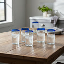 The Talavera Hub hand-blown clear glass tumblers with cobalt blue rims, 18 oz capacity, set of 6.