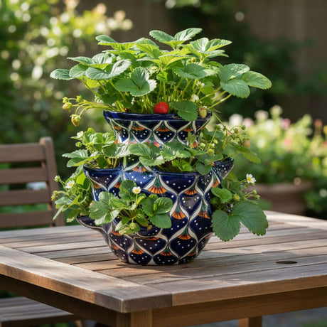 The Talavera Hub blue ceramic strawberry planter with peacock design, 10.5" tall, hand-painted with lead-free glaze.