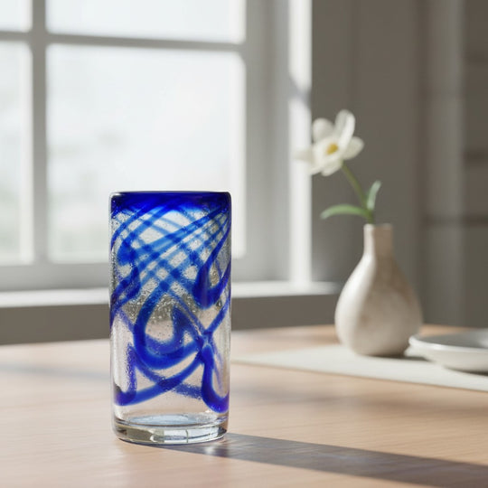 The Talavera Hub hand-blown glass with blue swirl design. 20 oz capacity, 6" tall.