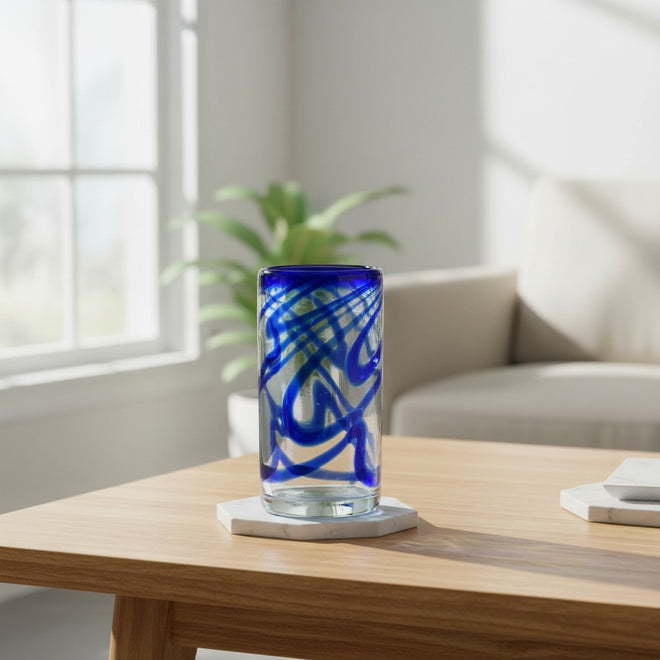 The Talavera Hub hand-blown glass with blue swirl design, 20 oz capacity, 6" tall.
