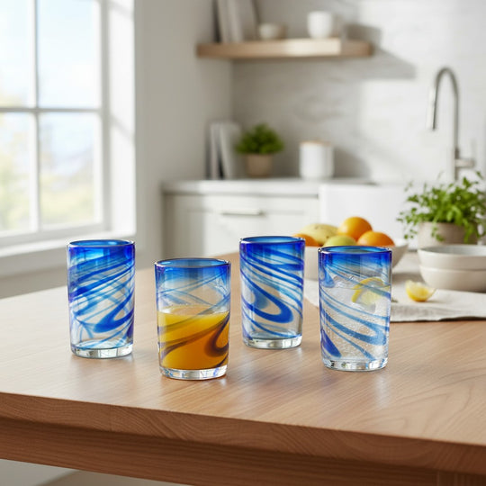 The Talavera Hub blue swirl hand-blown recycled glass tumblers, set of 4, 16oz capacity, 5" tall.