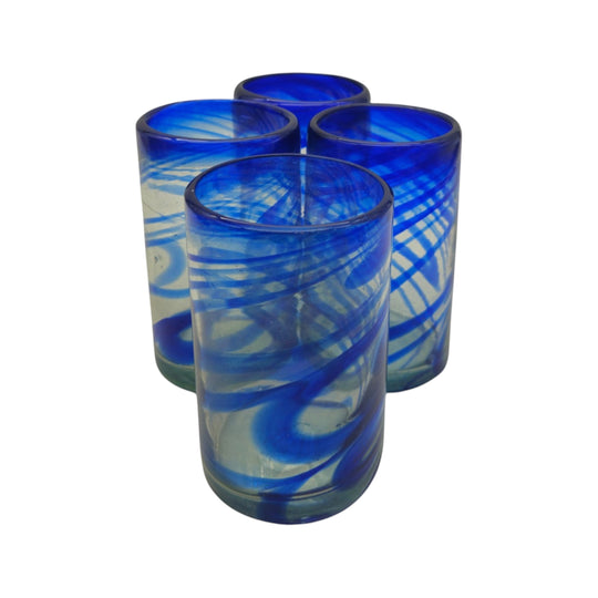 The Talavera Hub blue swirl hand-blown recycled glass tumblers, 16 oz set of 4. Cobalt blue swirls on clear glass.