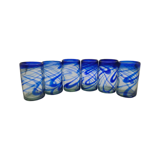The Talavera Hub blue swirl hand-blown recycled glass tumblers, set of 6. Each 16oz glass features unique cobalt blue swirls.