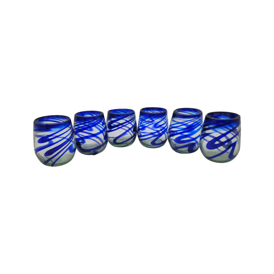 The Talavera Hub hand-blown stemless wine glasses with blue swirls, made from recycled glass.