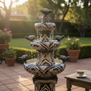 The Talavera Hub blue and white ceramic tiered fountain with birds and floral motifs, 44 inches tall.