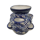 The Talavera Hub handmade Mexican ceramic strawberry planter with blue and white floral patterns and planting pockets.