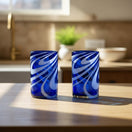 The Talavera Hub blue and white swirl hand-blown glass tumbler, 16 oz.
