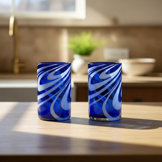 The Talavera Hub blue and white swirl hand-blown glass tumbler, 16 oz.
