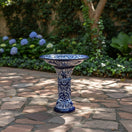The Talavera Hub blue and white ceramic Talavera bird bath with floral motif, 27" tall, 18" diameter.