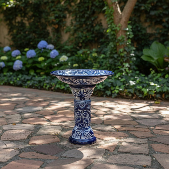 The Talavera Hub blue and white ceramic Talavera bird bath with floral motif, 27" tall, 18" diameter.