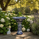The Talavera Hub blue and white ceramic Talavera bird bath with floral motif, 27" tall, 18" diameter.