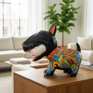 The Talavera Hub hand-painted ceramic Bull Terrier dog decor with bone, featuring vibrant Talavera patterns and a black finish.