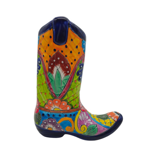 The Talavera Hub hand-painted ceramic cowboy boot planter featuring vibrant floral and geometric Mexican patterns.