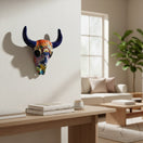 The Talavera Hub handcrafted ceramic bull skull wall decor with vibrant hand-painted floral patterns in a bright room.