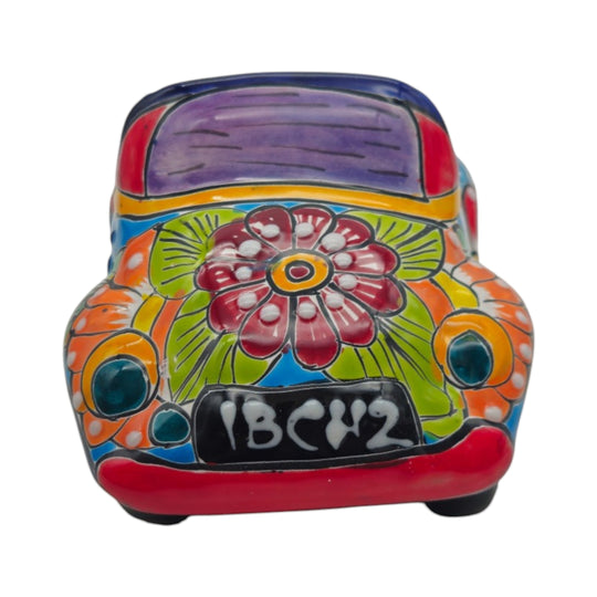 The Talavera Hub small ceramic car planter with vibrant hand-painted floral folk-art patterns in multicolor glaze.