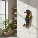 The Talavera Hub handcrafted ceramic seahorse wall art with vibrant, hand-painted Mexican folk-art floral patterns.