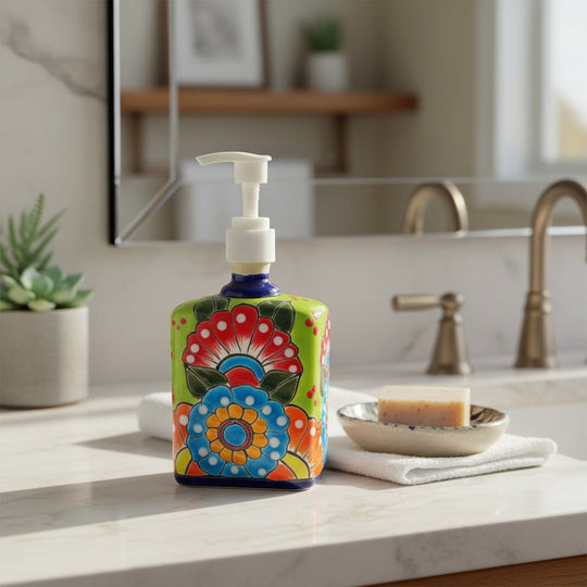 The Talavera Hub hand-painted ceramic soap pump with vibrant floral patterns in red, blue, green, and orange.
