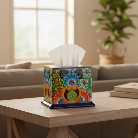 The Talavera Hub hand-painted ceramic tissue box cover with vibrant floral patterns on a wooden table.