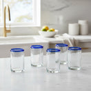 The Talavera Hub hand-blown clear glass tumblers with cobalt blue rims, set of 6.