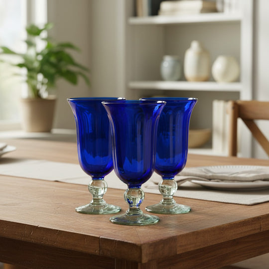 The Talavera Hub hand-blown cobalt blue glass sundae dishes with clear stems. Set of 4.