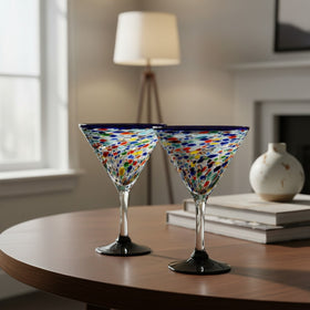 The Talavera Hub hand-blown glass martini glass with confetti pattern and blue rim. Holds 12 oz.