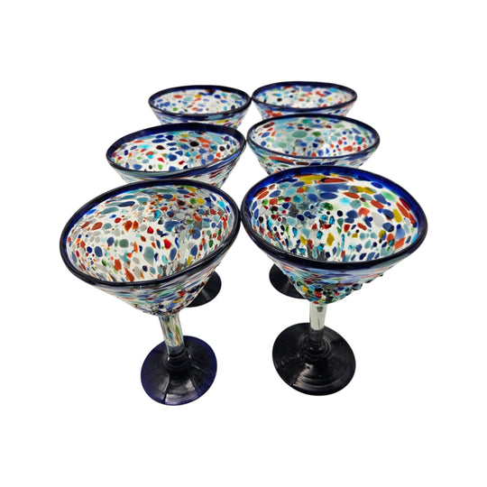 The Talavera Hub hand-blown glass martini glasses with confetti pattern and blue rim. Set of 6.