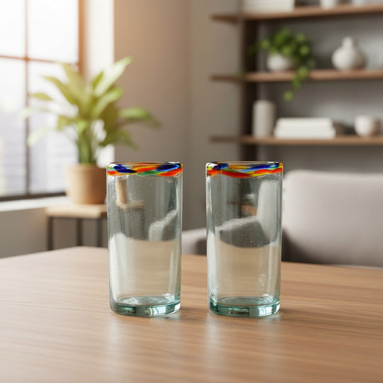 The Talavera Hub hand-blown clear glass tumbler with a colorful confetti rim, 18 oz capacity.