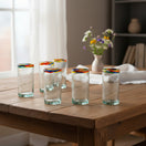 The Talavera Hub hand-blown clear glass tumblers with colorful confetti rims, set of 6.