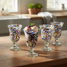 The Talavera Hub hand-blown Mexican sundae glasses with confetti rock design in red, blue, orange, and green speckles.