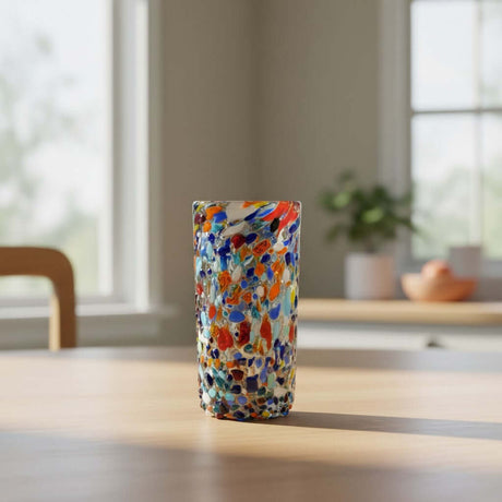 The Talavera Hub hand blown double shot glass with colorful confetti pattern embedded in clear glass.