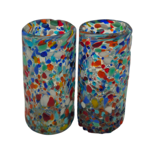 The Talavera Hub hand blown double shot glasses with colorful confetti pattern, made from lead-free glass.
