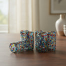 The Talavera Hub hand blown double shot glasses with colorful confetti pattern, made of lead-free glass.