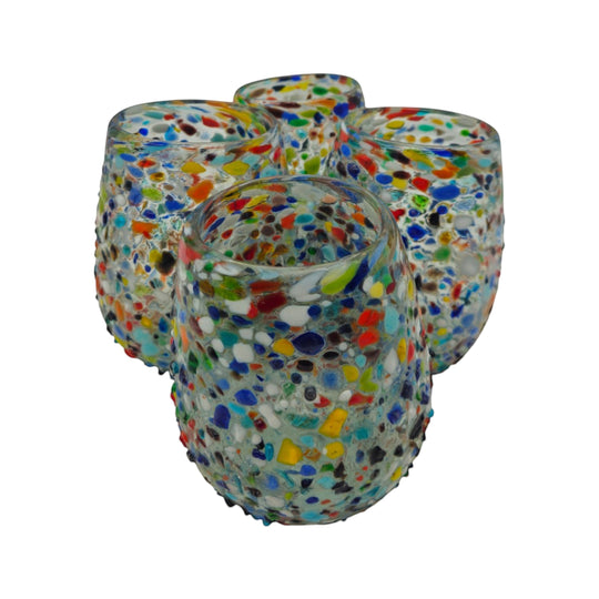 The Talavera Hub hand-blown stemless wine glasses with colorful confetti pattern and pebbled texture. Set of 4, 12 oz capacity.