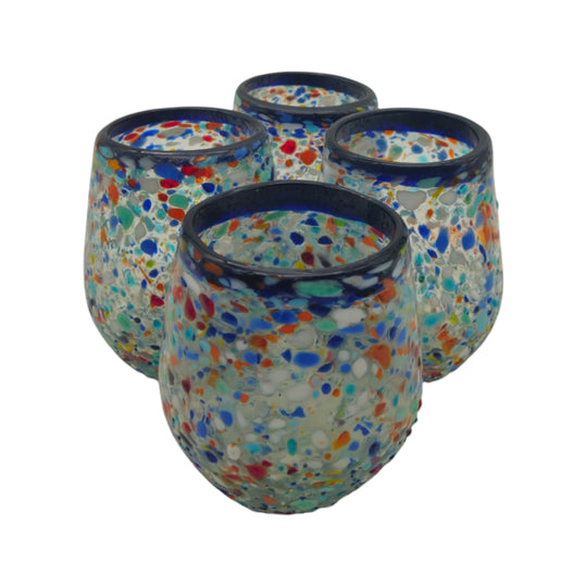 The Talavera Hub hand-blown stemless wine glass with blue rim and colorful confetti recycled glass texture. Holds 12 oz.
