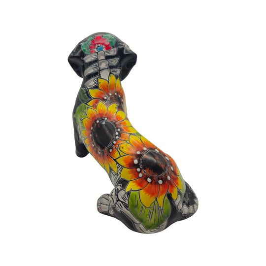 The Talavera Hub black ceramic dachshund figurine with Day of the Dead floral and skeleton design. Hand-painted glaze.