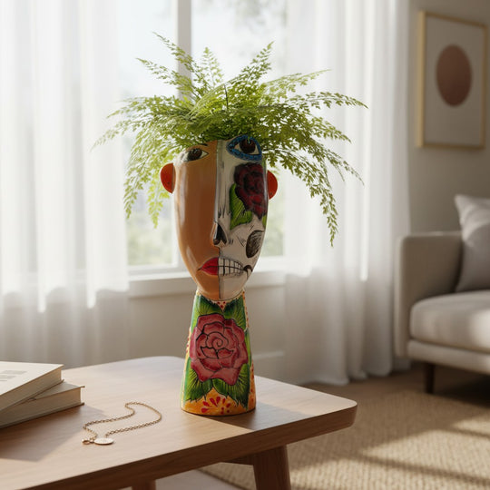 The Talavera Hub Talavera Lady Planter with Day of the Dead face design, ceramic, hand-painted with floral accents.