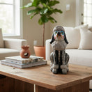 The Talavera Hub gray and black ceramic poodle statue with Day of the Dead painted face details. 8.5" tall.