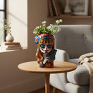 The Talavera Hub Day of the Dead skull planter with butterfly and floral design, hand-painted ceramic in orange, blue, and purple.
