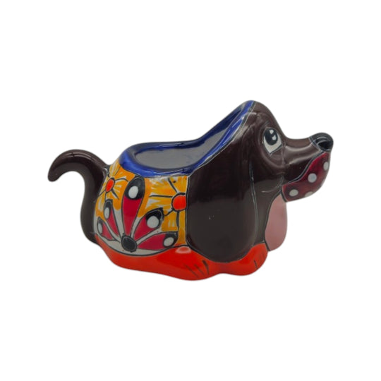 The Talavera Hub small dog-shaped planter with hand-painted Mexican pottery patterns in vibrant colors.