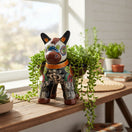 The Talavera Hub colorful ceramic donkey planter with Day of the Dead art, featuring floral motifs and skeleton details. Approx 12" tall.