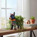 The Talavera Hub vibrant Mexican donkey planter, handcrafted ceramic with hand-painted floral patterns in blue, green, yellow, and red.