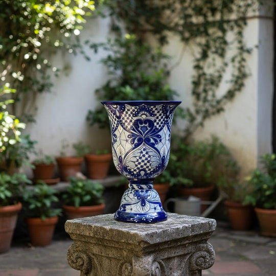 The Talavera Hub Extra Large Hand-Painted Blue & White Talavera Pedestal Planter with intricate patterns.