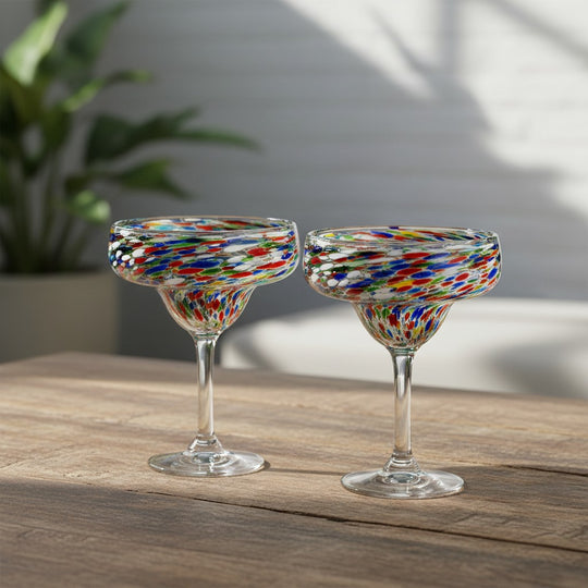 The Talavera Hub hand-blown Mexican margarita glasses with colorful pebbled confetti design. Lead-free glass.