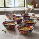 The Talavera Hub handmade 7.5-inch ceramic soup bowls with vibrant, hand-painted Mexican floral patterns on a table.