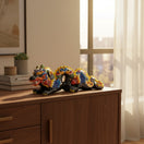 The Talavera Hub handmade multicolored ceramic dragon statue with intricate patterns and bold colors, inspired by Mexican art.