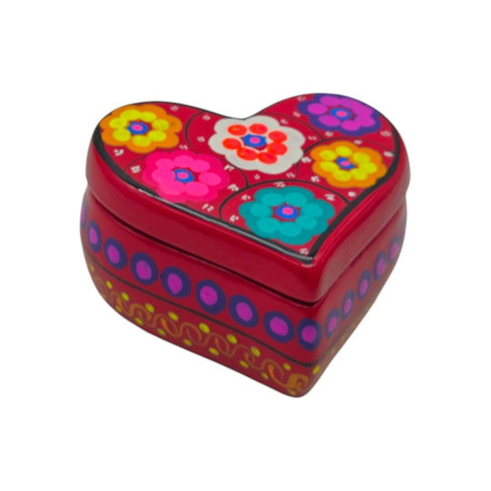 The Talavera Hub heart-shaped Mexican ceramic jewelry box with hand-painted floral patterns in red, pink, and blue.